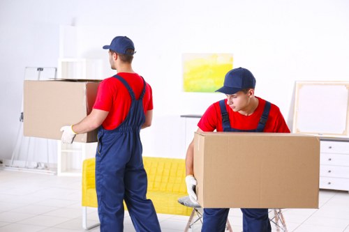 Removal van and moving boxes prepared for a Wembley Park home move