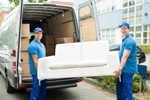Removal team planning a move in a Wembley Park apartment building