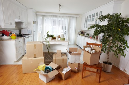 Commercial moving team handling office furniture and boxes in Wembley Park