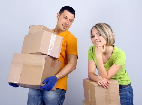 Moving team protecting furniture during a Wembleypark van service