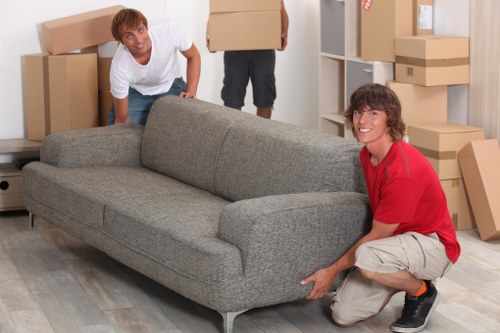 Family home moving scene with boxes and furniture for a Wembley Park relocation