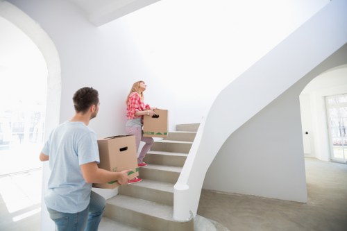 Movers handling boxes and furniture in Wembley Park
